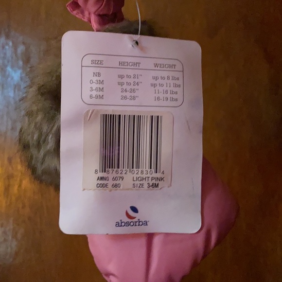 Absorbs slightly hot pink snowsuit. Great a cold weather day. - Picture 6 of 9